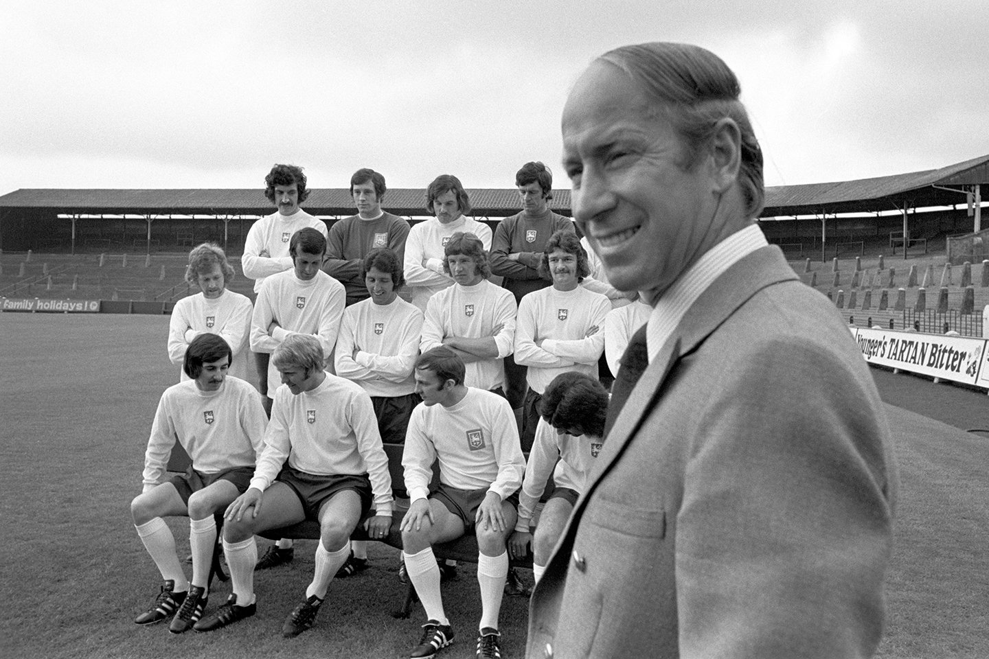 Bobby Charlton with his team