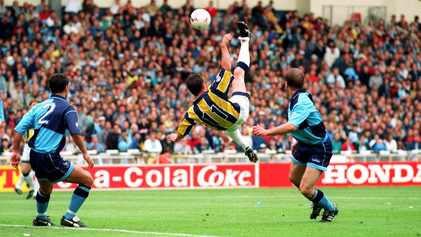Ian Bryson scores an overhead kick at Wembley