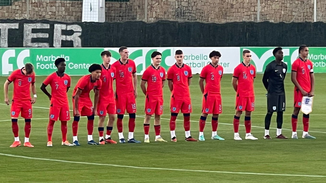 Kian Best lining up alongside his England teammates ahead of kick-off.